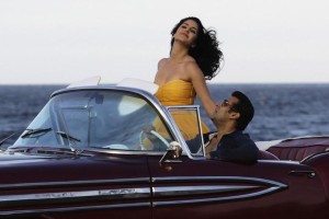 Bollywood star Salman Khan drives with Katrina Kaif in a convertible car on Havana's seafront boulevard El Malecon
